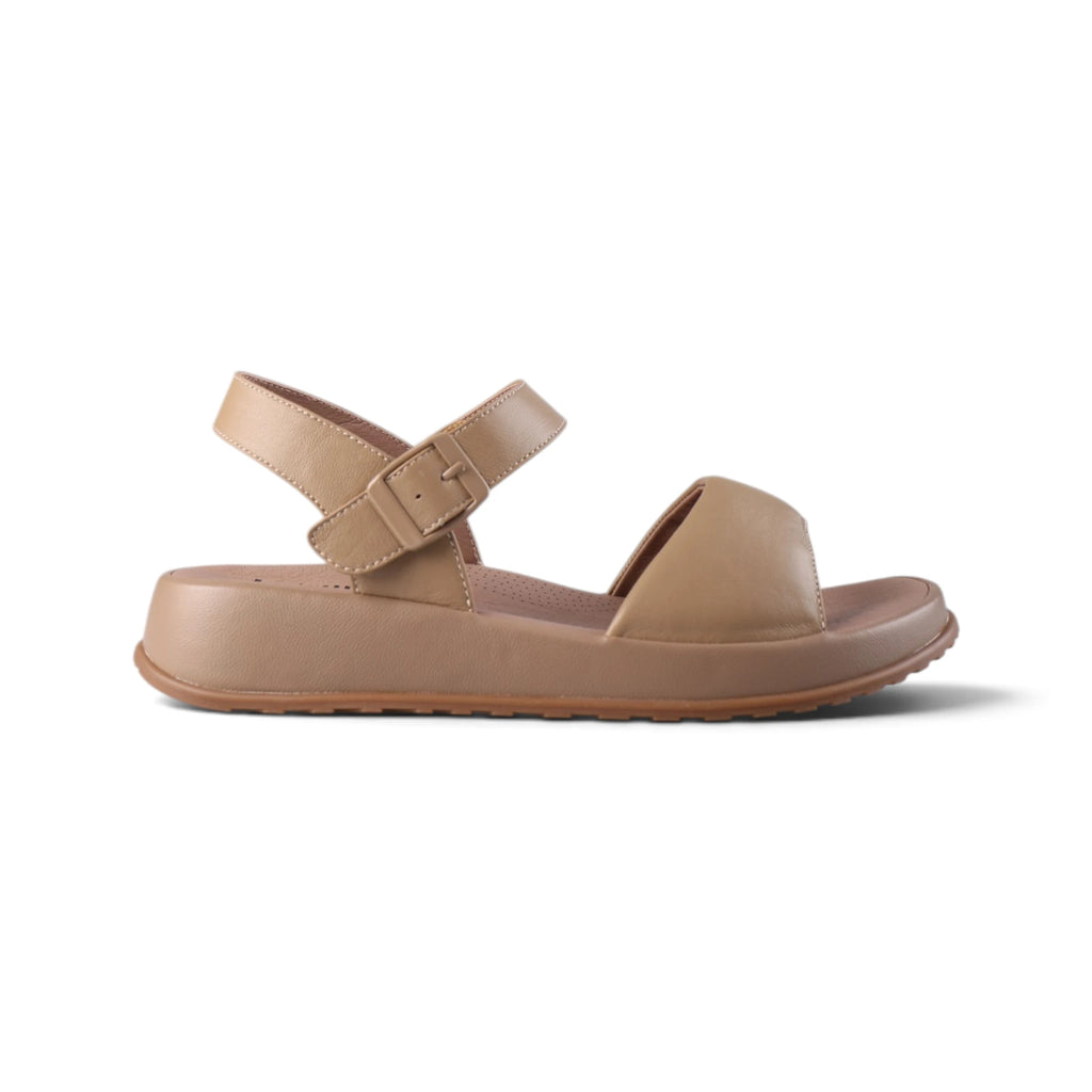 A single tan leather slide sandal with an adjustable ankle strap and a thick platform sole, shown in profile against a white background.